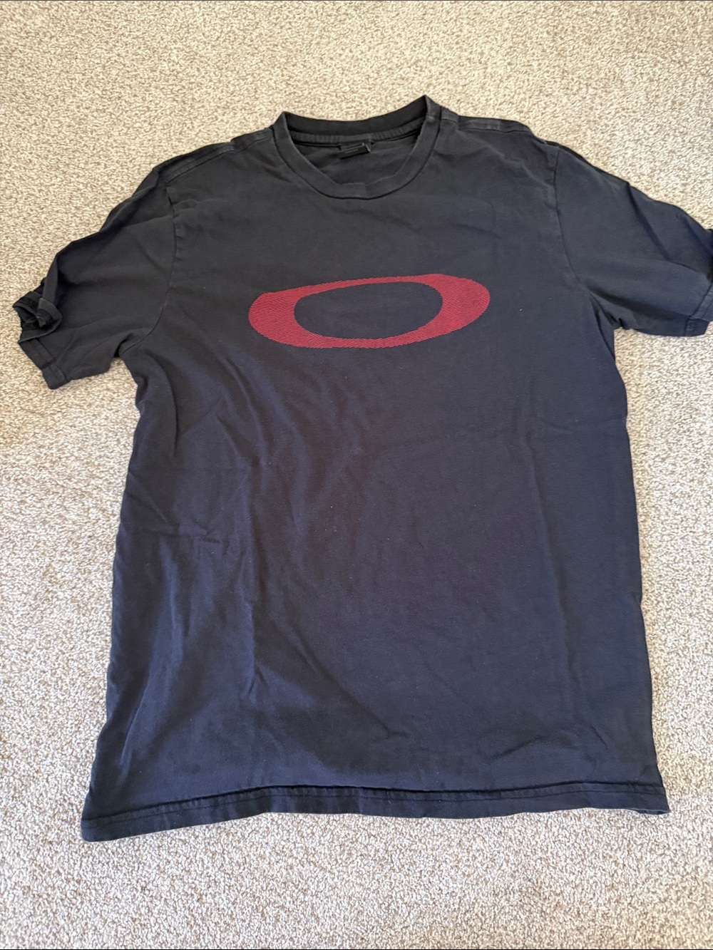 Oakley Black Short Sleeve Tee with Red Oval Logo